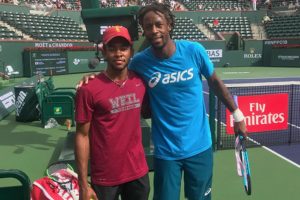 Top 10 ATP tennis pro Gael Monfils on court with Weil Tennis Academy training partner at 2017 BNP Paribas Open at Indian Wells CA USA Top 10 ATP tennis pro Gael Monfils from France on court with Weil Tennis Academy training partner. All the Top WTA and ATP pros hit with Weil Academy tennis players to warm up properly for all their big matches at the Larry Ellison owned BNP Paribas Open at Indian Wells CA USA every year.